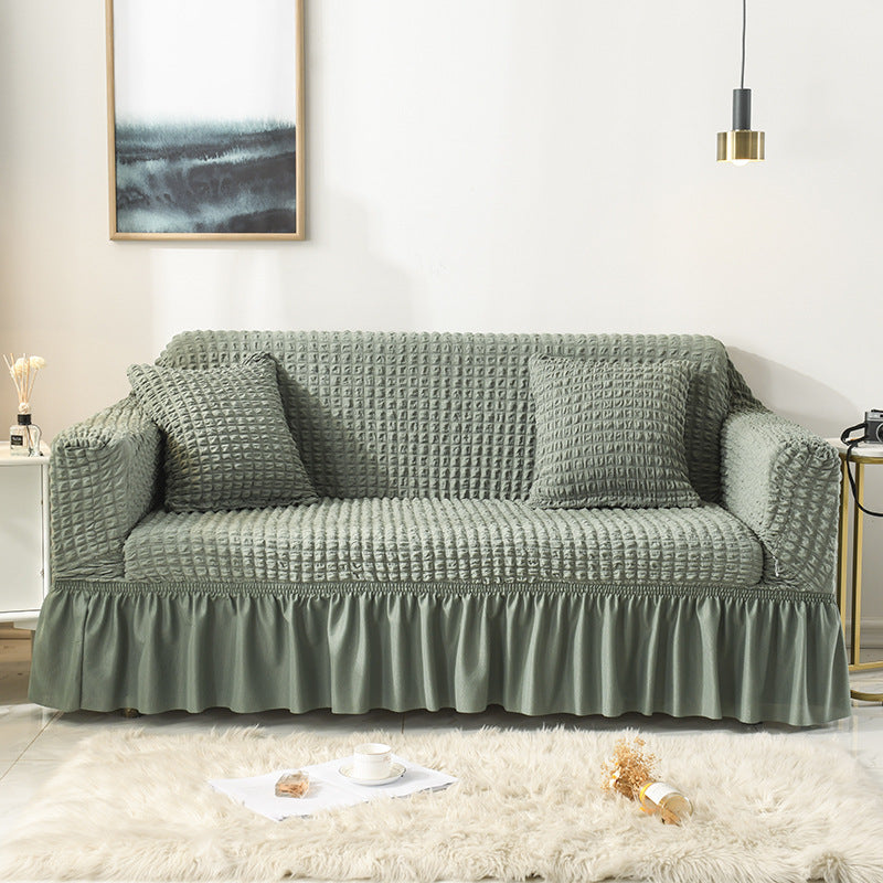 🛋️ 50% RABATT! 🎄 Universeller Sofabezug mit Rüschenrock – Dehnbar, rutschfest & perfekt für Weihnachten und den täglichen Schutz ✨
