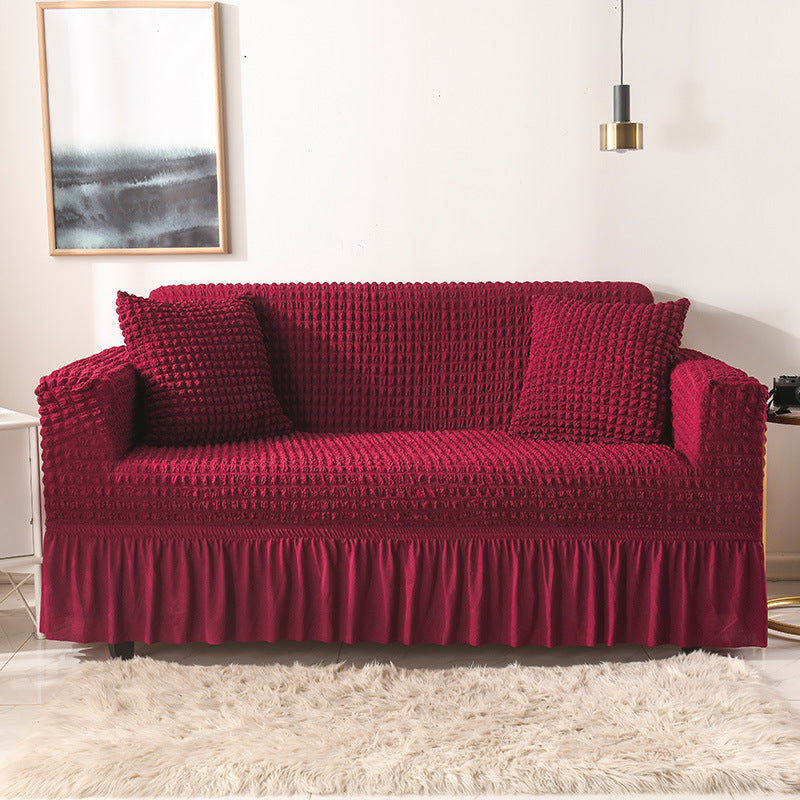 🛋️ 50% RABATT! 🎄 Universeller Sofabezug mit Rüschenrock – Dehnbar, rutschfest & perfekt für Weihnachten und den täglichen Schutz ✨