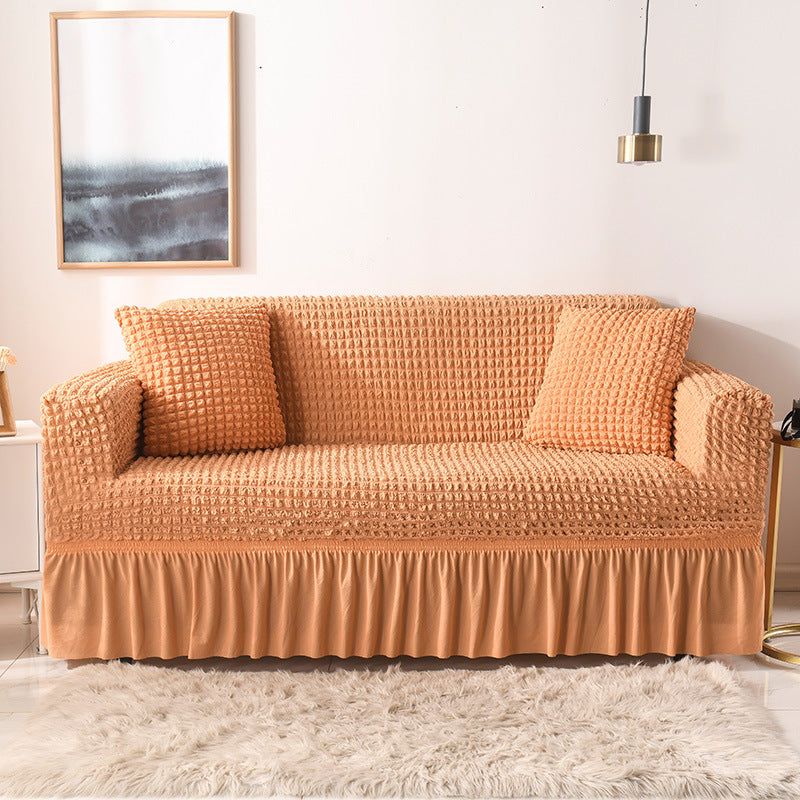 🛋️ 50% RABATT! 🎄 Universeller Sofabezug mit Rüschenrock – Dehnbar, rutschfest & perfekt für Weihnachten und den täglichen Schutz ✨